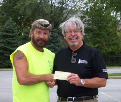Hogs and Heroes Check Presentation 9-18-12